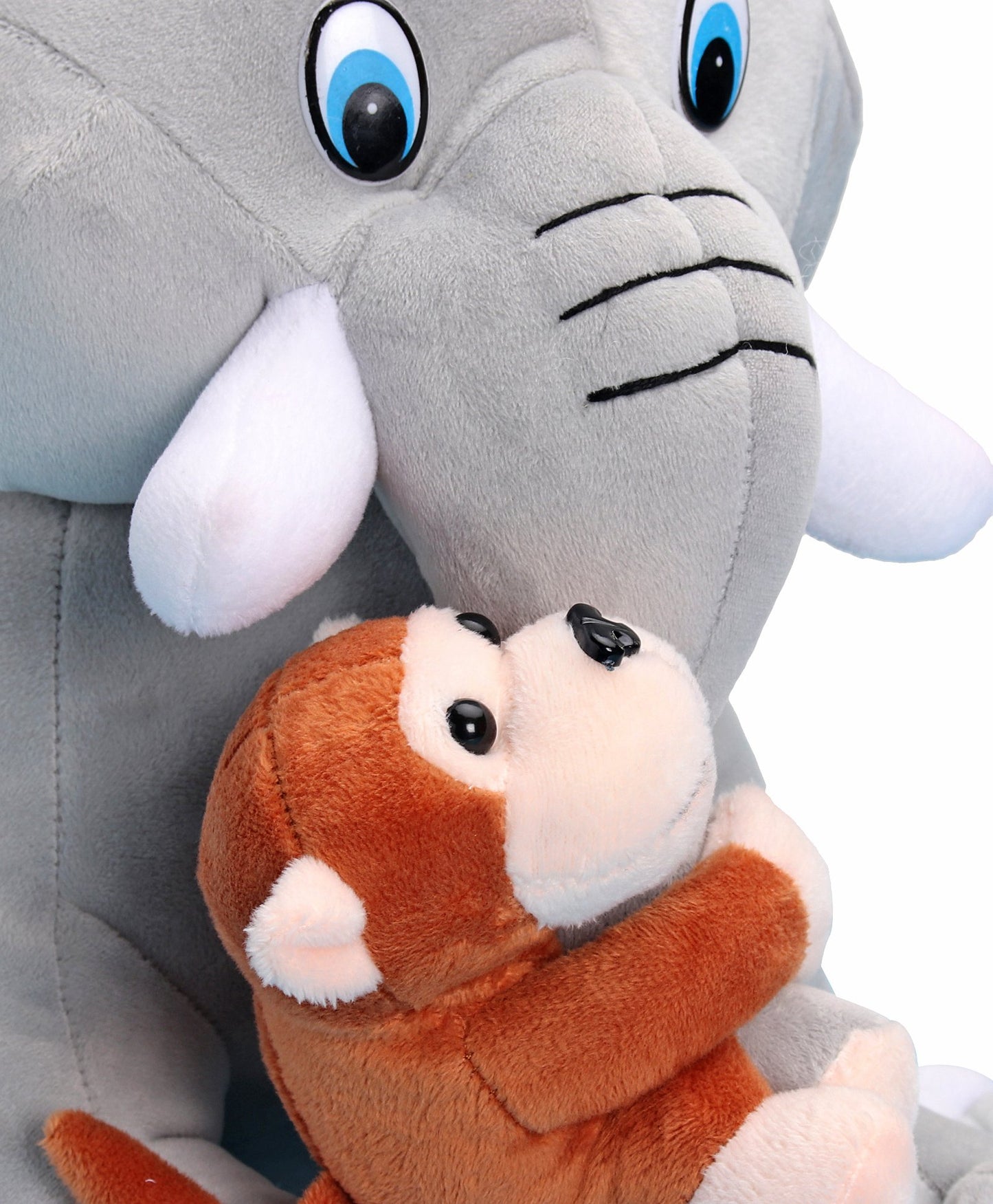 Monkey hugging elephant soft toy
